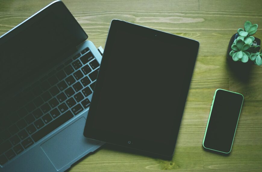 Photo of a laptop, tablet, and phone