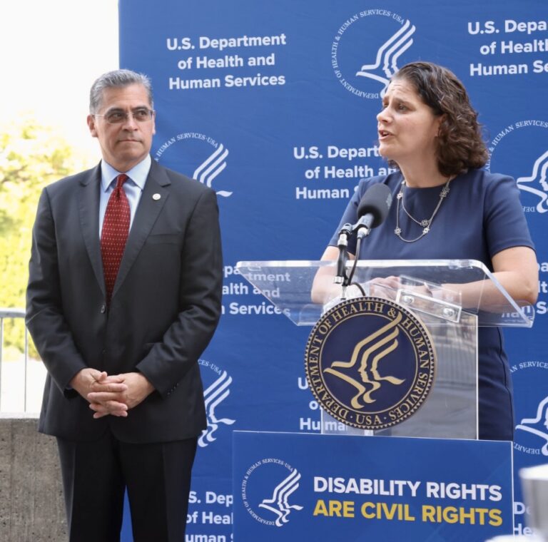 HHS Secretary Xavier Bacerra stands next to ACL Principal Deputy Administrator Alison Barkoff at a press Conference