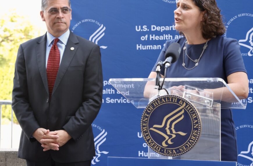 HHS Secretary Xavier Bacerra stands next to ACL Principal Deputy Administrator Alison Barkoff at a press Conference