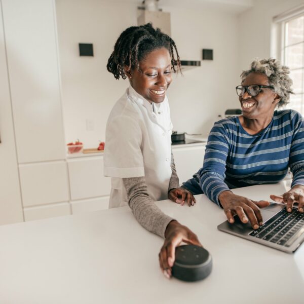 DSP with an aging woman, a tablet and a smart speaker