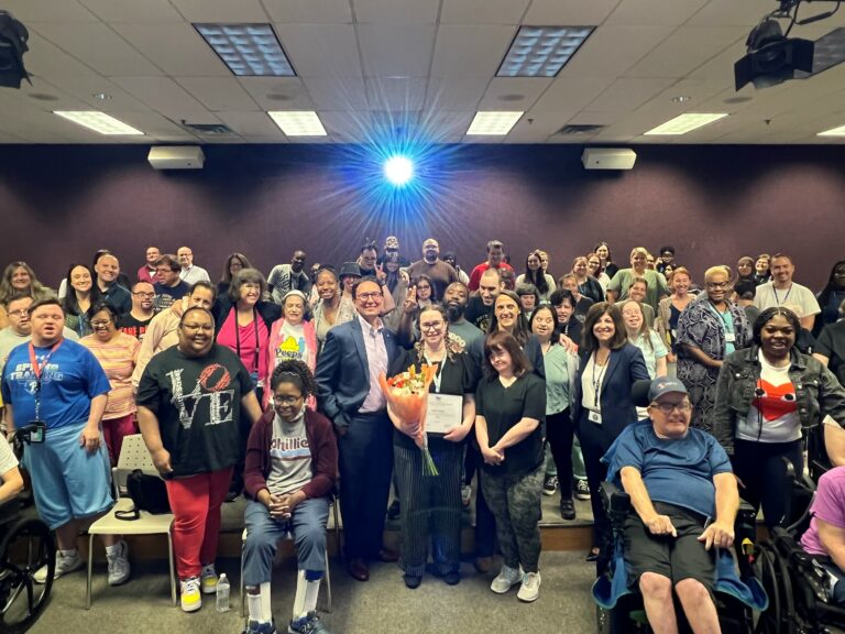 A group picture of SPIN program participants gathered around Heather Radcliffe, Jeremy Yale, and Kristin Ahrens