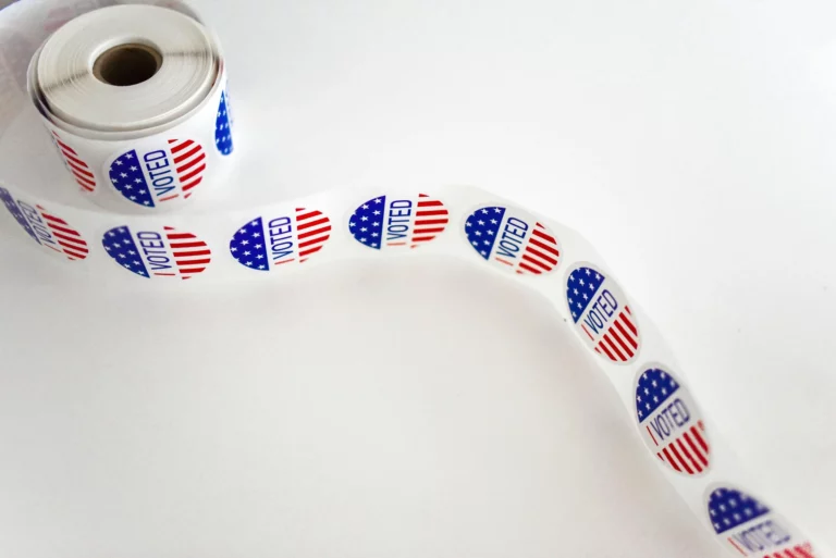 An unfurling roll of "I Voted" stickers