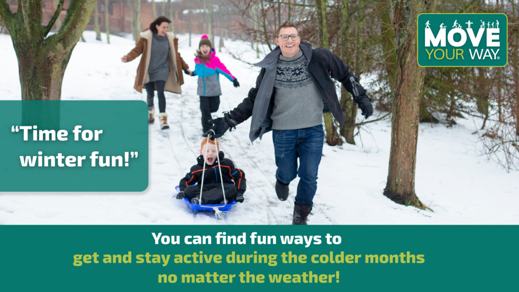 A nuclear family runs through the snow. Dad pulls the son in a sled while mom and daughter trail behind