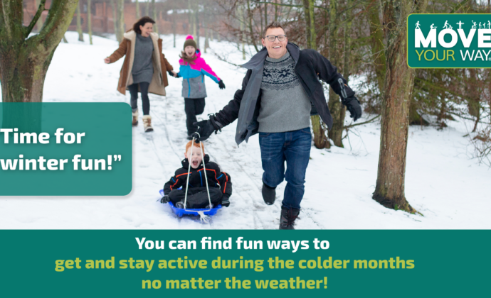 A nuclear family runs through the snow. Dad pulls the son in a sled while mom and daughter trail behind