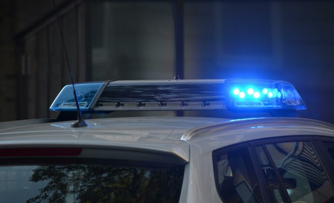 Blue siren lights on top of a police car