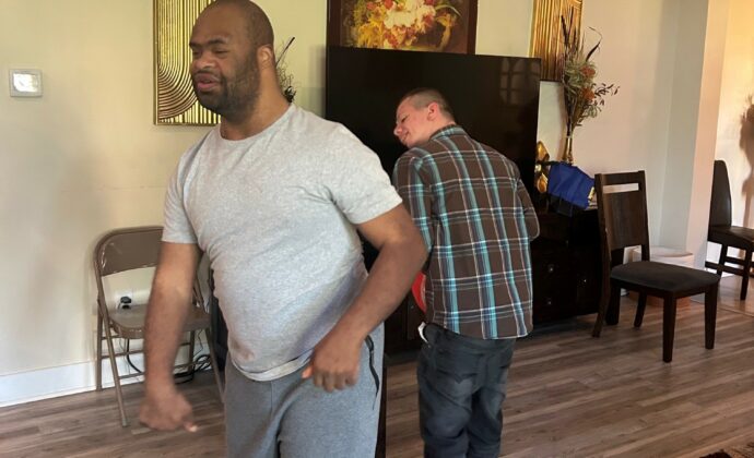 Eric H. and Corey M. - two men - dancing at Brian's House.